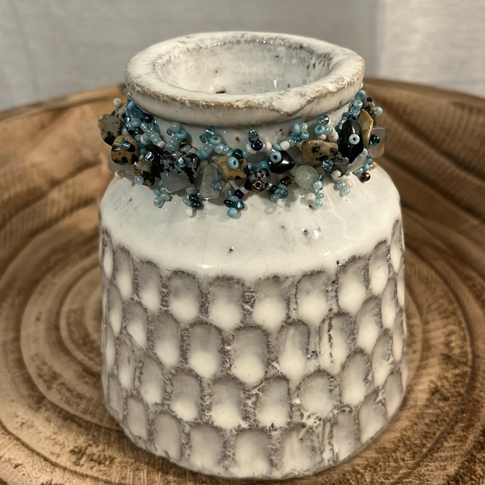 Beach style stretch bracelet.  Seed bead detail. Loop over bead ball closure.
